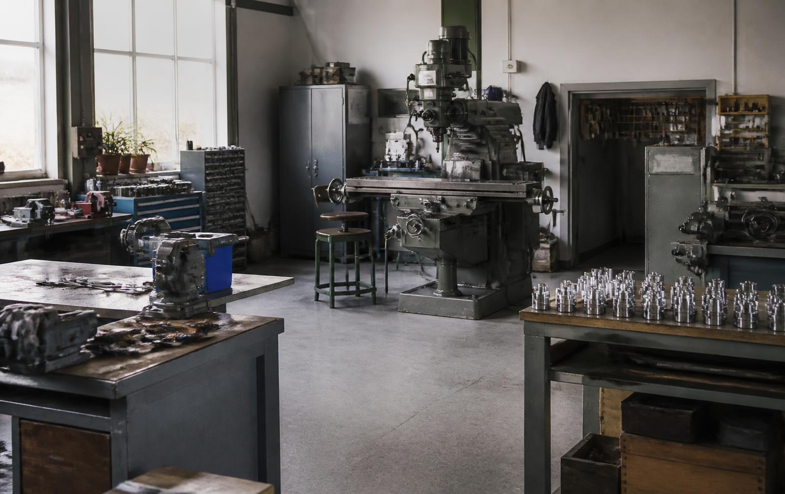 Interior of a small Michigan machine shop with milling equipment and workbenches